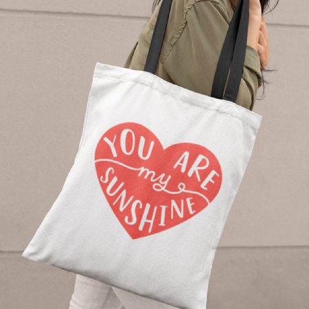 An everyday tote, made totally for you! Made from premium materials and a chic black handle, craft a personalized tote bag that suits your style. Available in three sizes: 18x18, 16x16, and 13x13